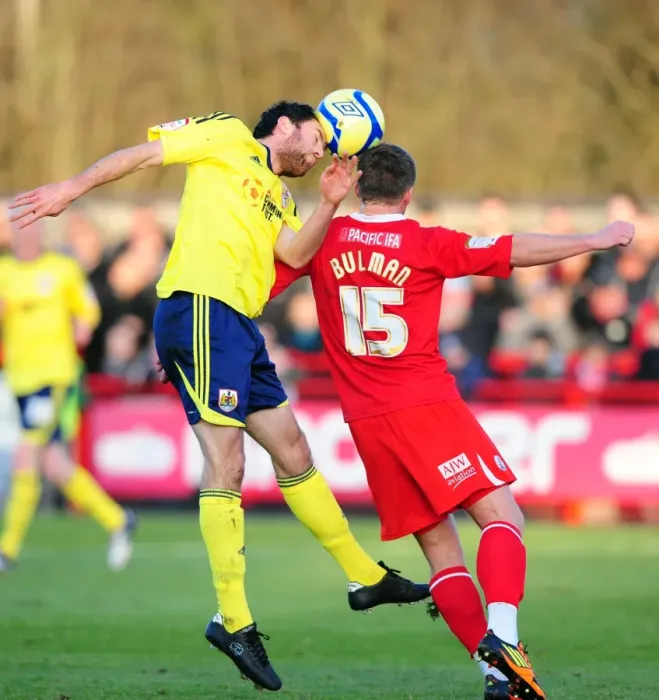 Framed Print : Bristol City's Cole Skuse vs. Dannie Bulman: FA Cup Battle at Crawley Town, 07 / 01 / 2012 Framed Print : Bristol City's Cole Skuse vs. Dannie Bulman: FA Cup Battle at Crawley Town, 07 / 01 / 2012