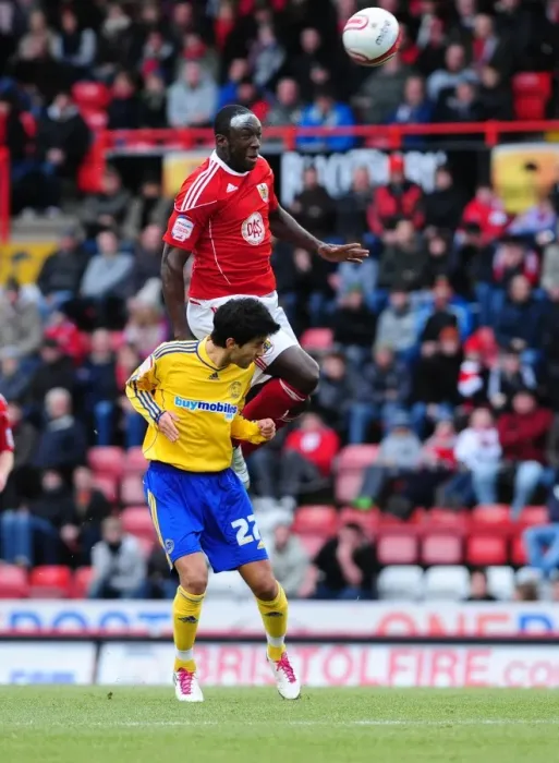 Framed Print : Bristol City's Damion Stewart Soars Above Derby County's Alberto Bueno in Championship Clash at Ashton Gate Framed Print : Bristol City's Damion Stewart Soars Above Derby County's Alberto Bueno in Championship Clash at Ashton Gate
