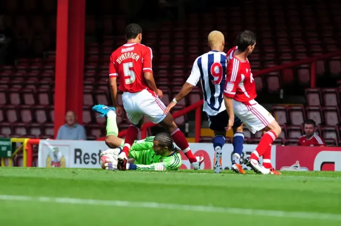 Framed Print : Bristol City's David James Denies West Brom's Peter Odemwingie: A Championship Showdown at Ashton Gate, 2011