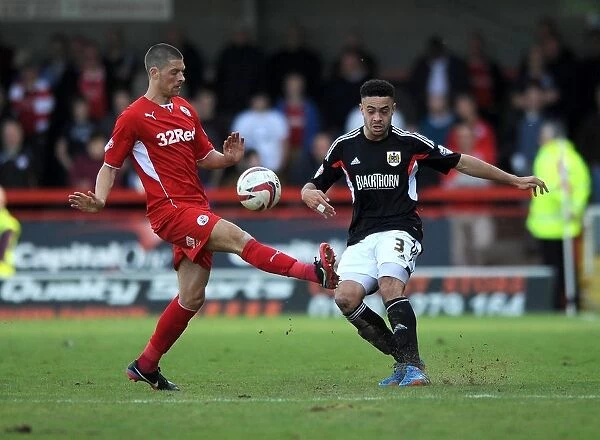 Bristol City's Derrick Williams Clears Under Pressure in Sky Bet League One Clash vs Crawley Town