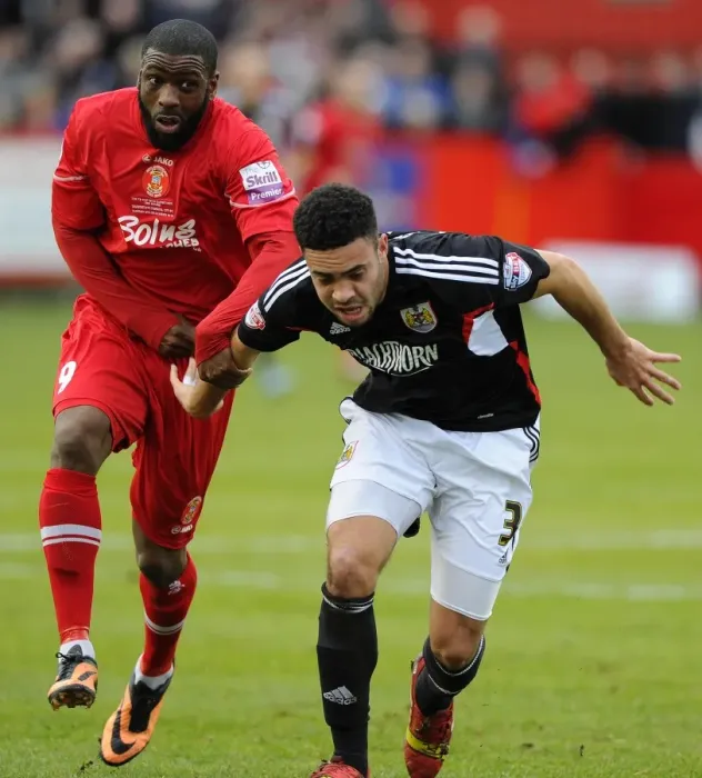 Framed Print : Bristol City's Derrick Williams Fouls Suffering under Justin Richards Challenge in FA Cup Match against Tamworth Framed Print : Bristol City's Derrick Williams Fouls Suffering under Justin Richards Challenge in FA Cup Match against Tamworth