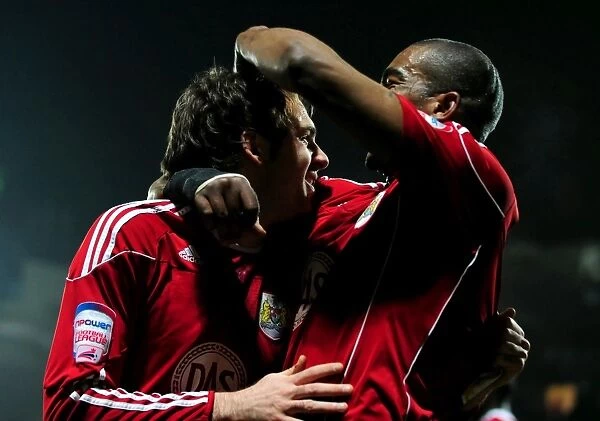 Bristol City's Double Trouble: Brett Pitman and Marvin Elliott Celebrate Winning Goals Against Watford (22 / 02 / 2011)