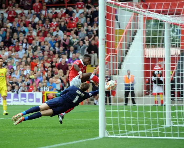 Framed Print : Bristol City's Dramatic Win: Kieran Agard Scores the Game-Winner Against MK Dons at Ashton Gate, September 2014 Framed Print : Bristol City's Dramatic Win: Kieran Agard Scores the Game-Winner Against MK Dons at Ashton Gate, September 2014