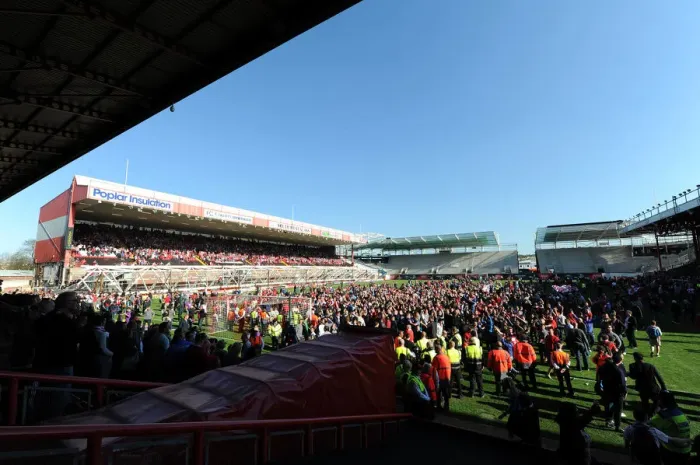 Framed Print : Bristol City's Euphoric Fans Invade Ashton Gate After Securing League One Victory Framed Print : Bristol City's Euphoric Fans Invade Ashton Gate After Securing League One Victory