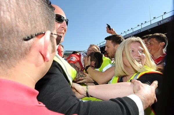 Bristol City's Euphoric Promotion: Chaos as Fans Rush the Pitch (18 / 04 / 2015)