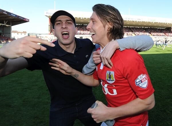 Bristol City's Euphoric Win: Luke Freeman Celebrates with Fans in the Thrilling League One Victory over Coventry City