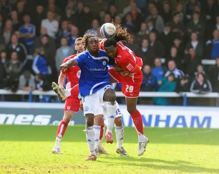 Framed Print : Bristol City's Evander Sno vs. Peterborough's Exodus Geohaghon: Championship Battle at London Road, 2010 Framed Print : Bristol City's Evander Sno vs. Peterborough's Exodus Geohaghon: Championship Battle at London Road, 2010
