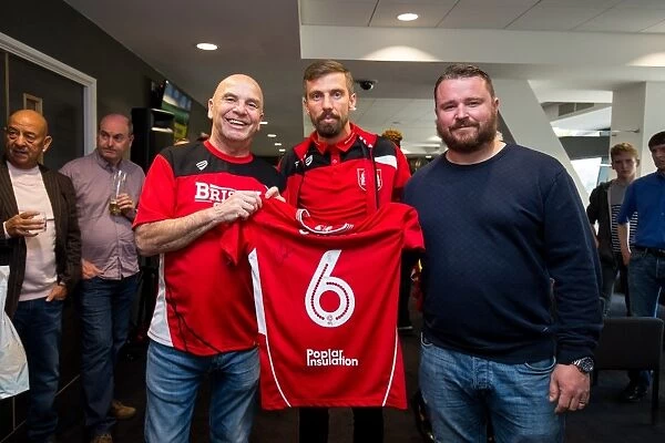 Bristol City's Gary O'Neil Presents Sponsors with Signed Shirt after Championship Match against Birmingham City
