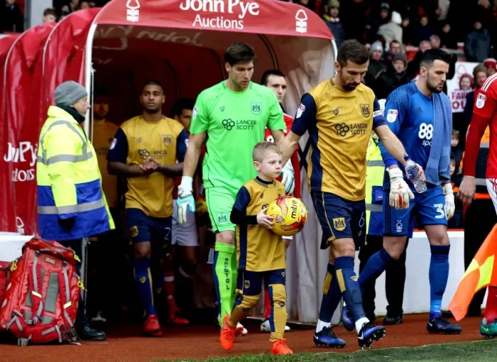 Framed Print : Bristol City's Gary O'Neil and Young Mascot Lead Team Out at The City Ground (Nottingham Forest vs. Bristol City, Sky Bet Championship)