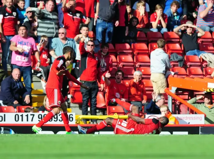 Framed Print : Bristol City's George Elokobi Suffers Horrific Injury: Captain Liam Fontaine and Fans React in Shock