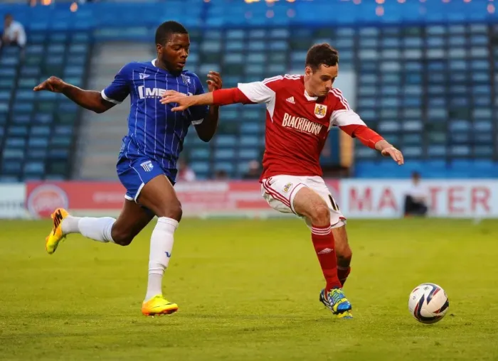 Framed Print : Bristol City's Greg Cunningham Blocks Antonio German's Shot at Priestfield Stadium, 2013