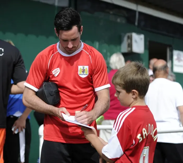 Framed Print : Bristol City's Greg Cunningham Connects with a Young Fan at Portishead Town Pre-Season Friendly Framed Print : Bristol City's Greg Cunningham Connects with a Young Fan at Portishead Town Pre-Season Friendly