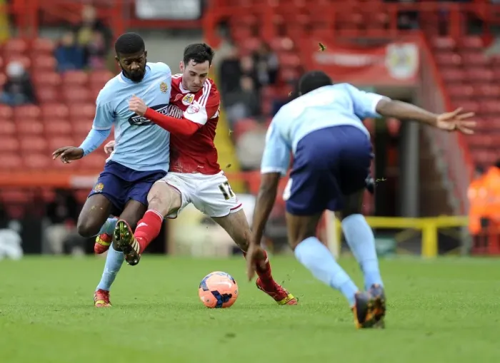 Framed Print : Bristol City's Greg Cunningham Fends Off Medy Elito in FA Cup Clash vs Dagenham and Redbridge Framed Print : Bristol City's Greg Cunningham Fends Off Medy Elito in FA Cup Clash vs Dagenham and Redbridge