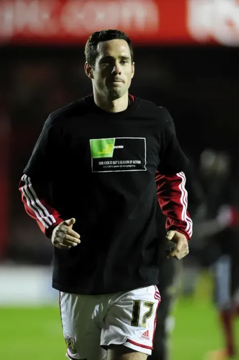 Framed Print : Bristol City's Greg Cunningham in Kick It Out Shirt during Bristol City vs Brentford Match, Sky Bet League One, 2013