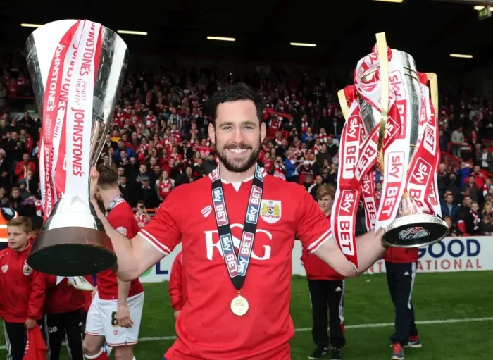 Framed Print : Bristol City's Greg Cunningham Lifts Sky Bet League One and JPT Trophies after Winning Double Framed Print : Bristol City's Greg Cunningham Lifts Sky Bet League One and JPT Trophies after Winning Double