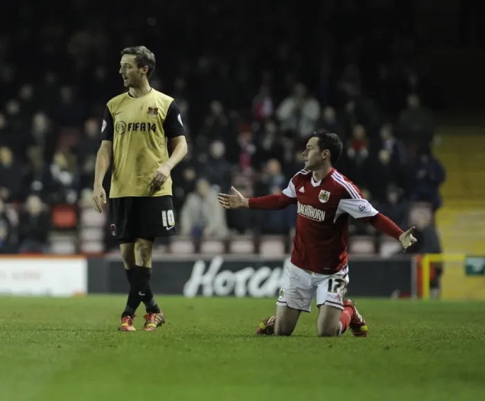 Framed Print : Bristol City's Greg Cunningham Reacts to Foul during Bristol City vs Leyton Orient, Sky Bet League One (November 2013)