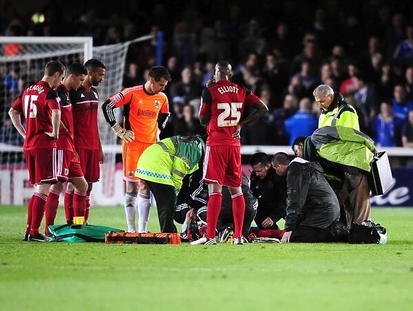 Bristol City's Greg Cunningham Receives Treatment During Peterborough United Match