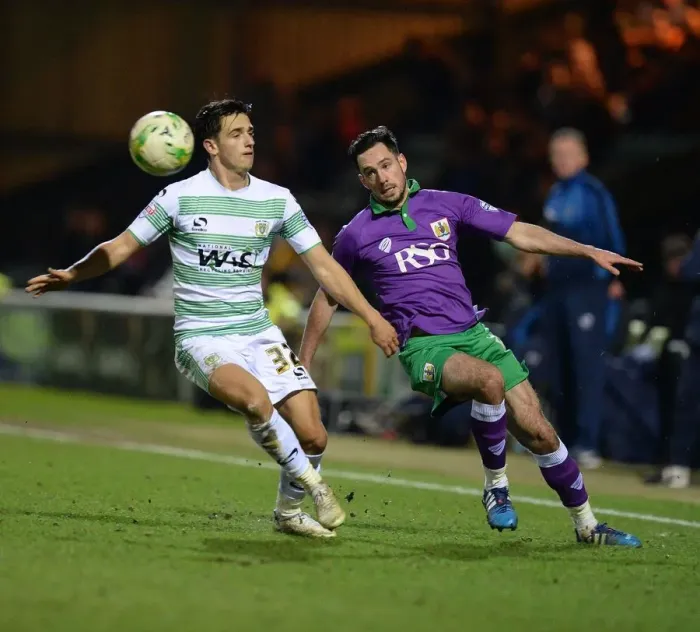 Framed Print : Bristol City's Greg Cunningham Scores Past Liam Shepard in Yeovil Town Showdown Framed Print : Bristol City's Greg Cunningham Scores Past Liam Shepard in Yeovil Town Showdown