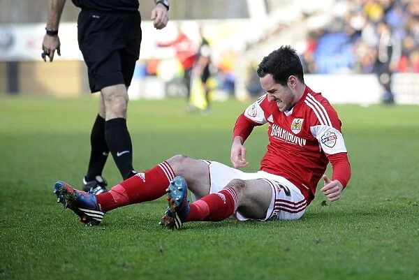 Bristol City's Greg Cunningham Suffers Injury on the Field during Shrewsbury Town vs. Bristol City Match, March 8, 2014