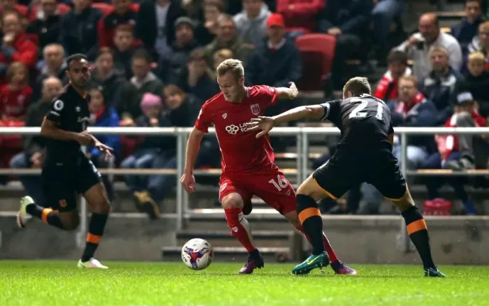 Framed Print : Bristol City's Gustav Engvall Outmaneuvers Hull City's Michael Dawson