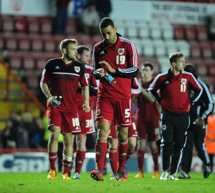 Framed Print : Bristol City's Heartbreaking Relegation: Lewin Nyatanga Walks Off After Loss to Birmingham City (April 16, 2013) Framed Print : Bristol City's Heartbreaking Relegation: Lewin Nyatanga Walks Off After Loss to Birmingham City (April 16, 2013)