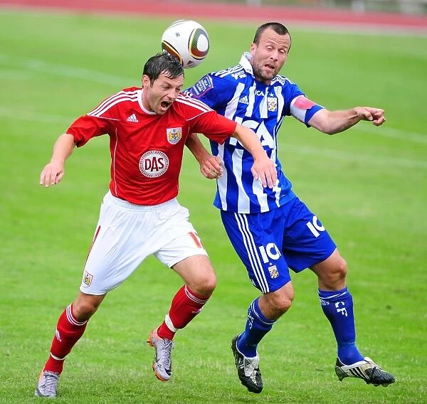 Bristol Citys Ivan Sproule battles for the ball