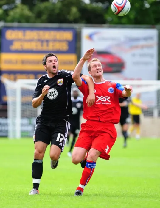 Framed Print : Bristol City's Ivan Sproule vs. Aldershot's Jamie Vincent: A Battle for Ball Possession Framed Print : Bristol City's Ivan Sproule vs. Aldershot's Jamie Vincent: A Battle for Ball Possession