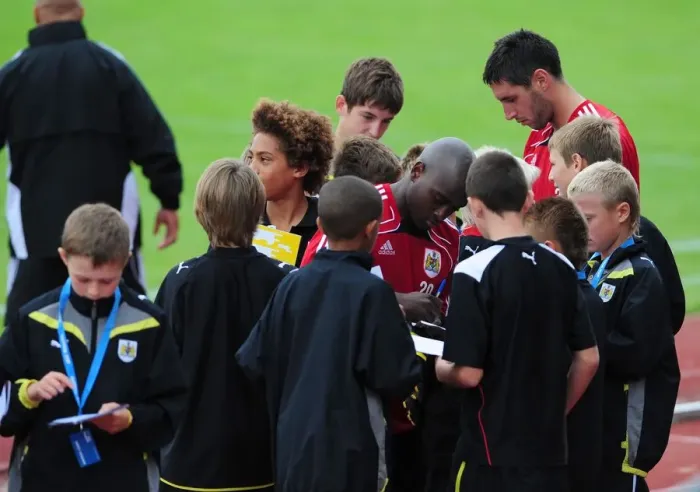 Framed Print : Bristol Citys Jamal Camplbell-Ryce and Bristol Citys Bradley Orr sign autographs for the academy