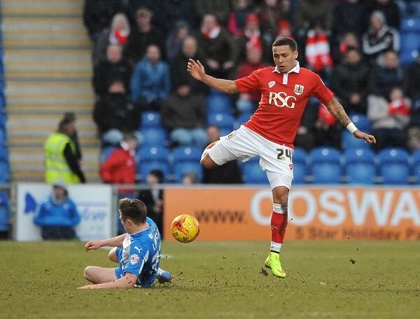 Bristol City's James Tavernier Tackled by Colchester United's Tom Lapslie during Colchester United vs. Bristol City, Sky Bet League One (February 21, 2015)