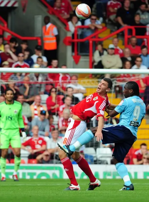 Framed Print : Bristol City's James Wilson Fouled by Hull City's Aaron Mclean in Championship Match, September 2011 - Editorial Use Only Framed Print : Bristol City's James Wilson Fouled by Hull City's Aaron Mclean in Championship Match, September 2011 - Editorial Use Only