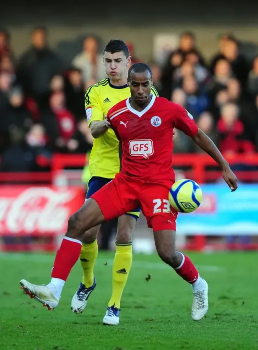 Framed Print : Bristol City's James Wilson vs. Tyrone Barnett in FA Cup Clash: Crawley Town v Bristol City (07 / 01 / 2012) Framed Print : Bristol City's James Wilson vs. Tyrone Barnett in FA Cup Clash: Crawley Town v Bristol City (07 / 01 / 2012)