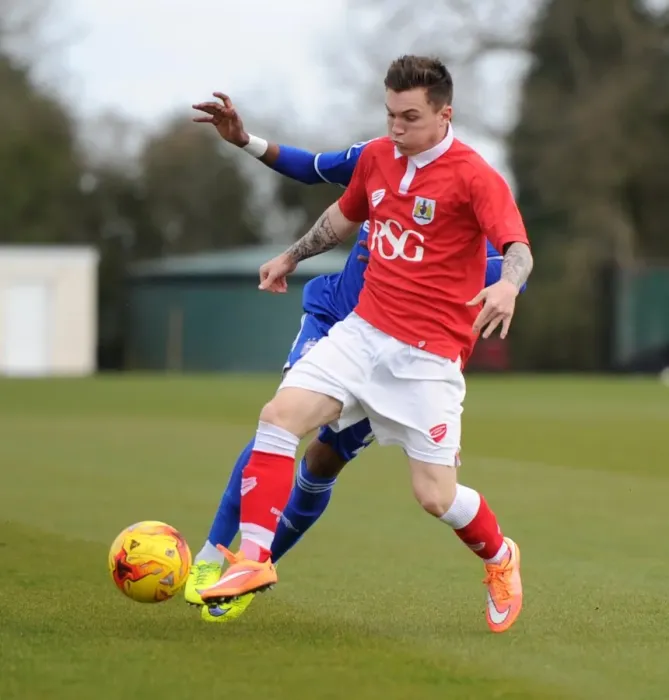 Framed Print : Bristol City's Jamie Horgan Takes the Ball from Ipswich Town's Kundai Benyu during U21 PDL2 Match