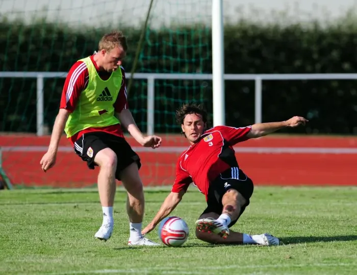 Framed Print : Bristol Citys Jamie McAllister battles for the ball with Bristol Citys David Clarkson