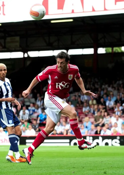 Framed Print : Bristol City's Jamie McAllister Clears the Ball in Championship Clash Against West Brom, 2011 Framed Print : Bristol City's Jamie McAllister Clears the Ball in Championship Clash Against West Brom, 2011