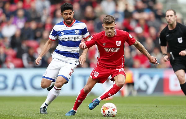 Bristol City's Jamie Paterson Evades Massimo Luongo of Queens Park Rangers during Sky Bet Championship Match
