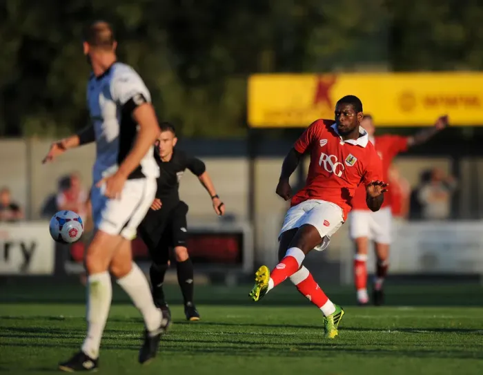 Framed Print : Bristol City's Jay Emmanuel-Thomas: Pursuing Victory - Pre-Season Goal Attempt at Woodspring Stadium (2014) Framed Print : Bristol City's Jay Emmanuel-Thomas: Pursuing Victory - Pre-Season Goal Attempt at Woodspring Stadium (2014)