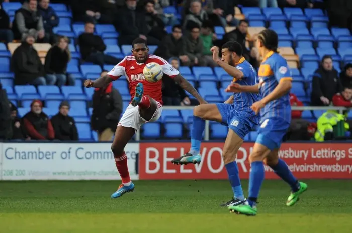 Framed Print : Bristol City's Jay Emmanuel-Thomas Beats Connor Goldson to the Ball in Shrewsbury Town Showdown Framed Print : Bristol City's Jay Emmanuel-Thomas Beats Connor Goldson to the Ball in Shrewsbury Town Showdown