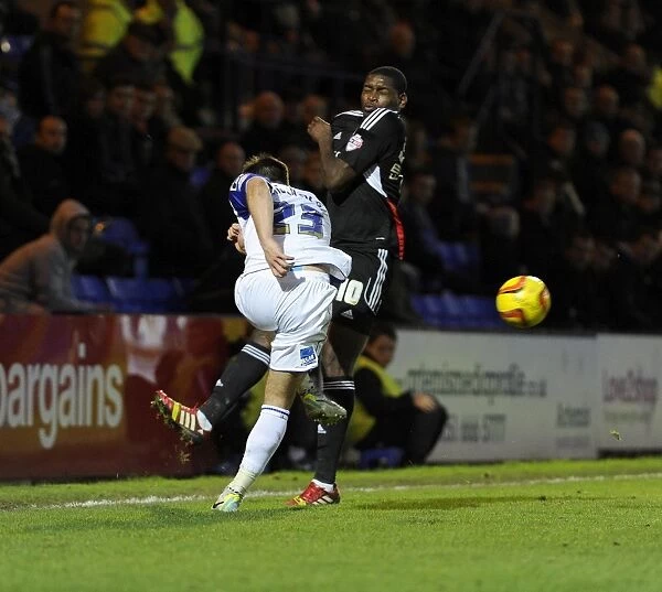 Bristol City's Jay Emmanuel-Thomas Closes In on Tranmere's Liam Ridehalgh during Sky Bet League One Match