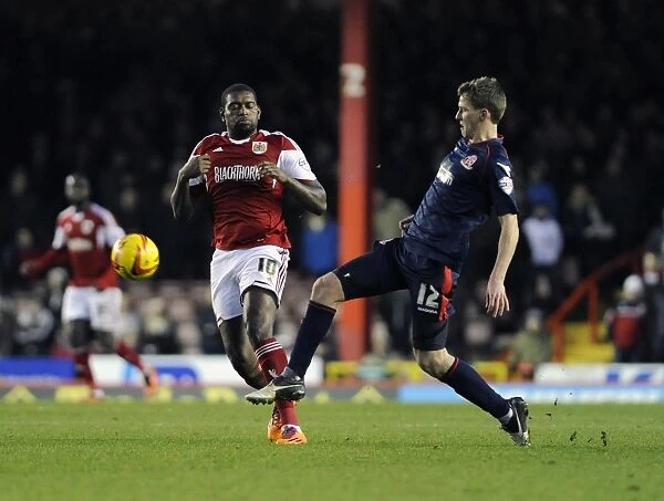 Bristol City's Jay Emmanuel-Thomas Closes In on Walsall's Paul Downing in Sky Bet League One Clash