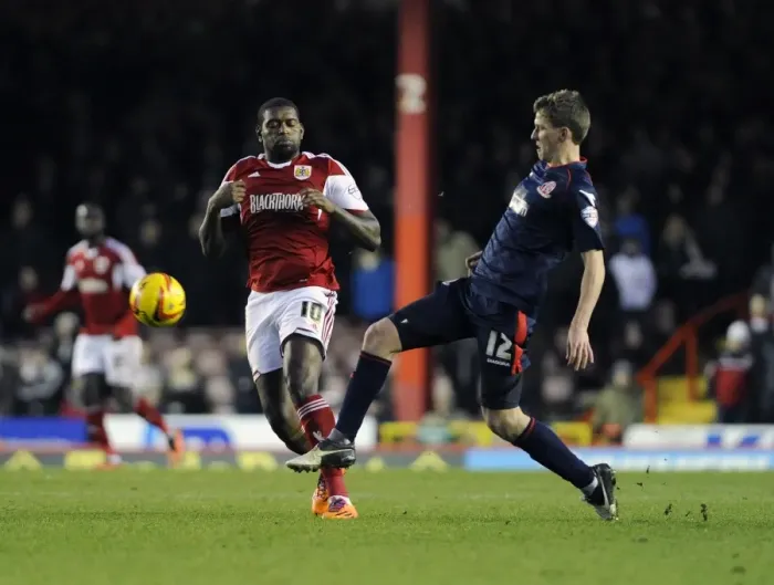 Framed Print : Bristol City's Jay Emmanuel-Thomas Closes In on Walsall's Paul Downing in Sky Bet League One Clash Framed Print : Bristol City's Jay Emmanuel-Thomas Closes In on Walsall's Paul Downing in Sky Bet League One Clash