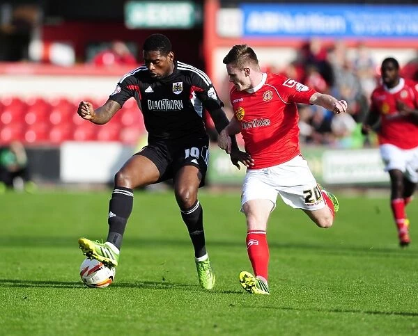 Bristol City's Jay Emmanuel-Thomas Faces Pressure from Crewe's Oliver Turton during Sky Bet League One Match