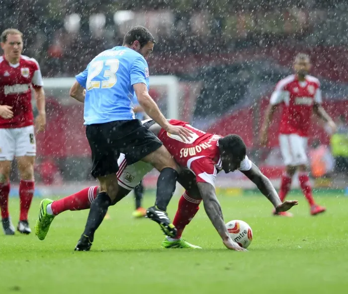 Framed Print : Bristol City's Jay Emmanuel-Thomas Fouled by Rory McArdle during Bradford City Match