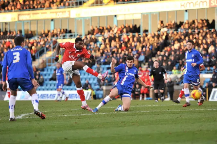 Framed Print : Bristol City's Jay Emmanuel-Thomas Goes for Glory against Gillingham