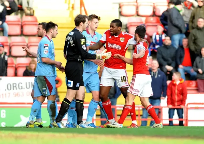 Framed Print : Bristol City's Jay Emmanuel-Thomas Intervenes in Heated Moment at Ashton Gate