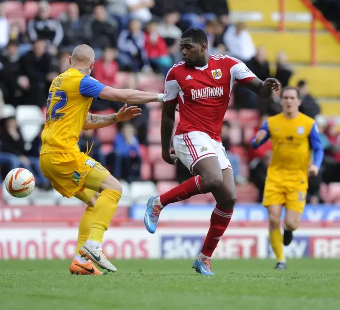 Framed Print : Bristol City's Jay Emmanuel-Thomas Overpowers Jack King in Sky Bet League One Showdown Framed Print : Bristol City's Jay Emmanuel-Thomas Overpowers Jack King in Sky Bet League One Showdown