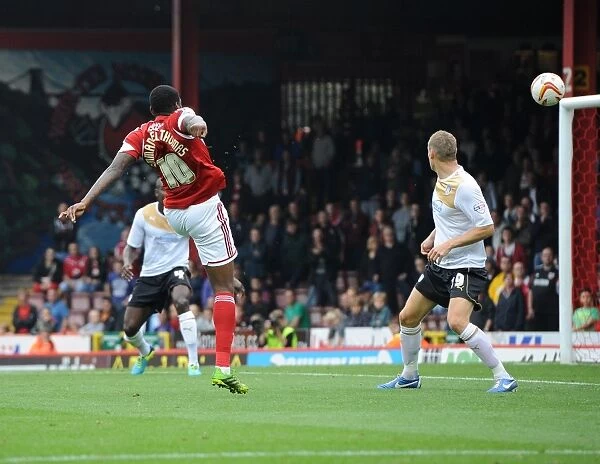 Bristol City's Jay Emmanuel-Thomas Scores a Missed Opportunity Against Colchester United, September 2013