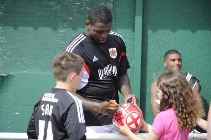 Framed Print : Bristol City's Jay Emmanuel-Thomas Signs Football at Portishead Town Pre-Season Friendly
