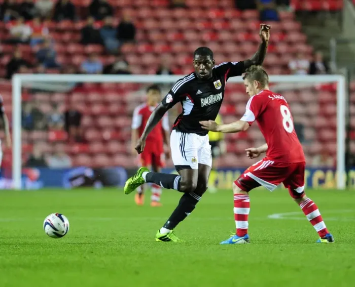 Framed Print : Bristol City's Jay Emmanuel-Thomas and Stephen McLaughlin Exchange a One-Two at Southampton's St Marys Stadium during the Capital One Cup Match