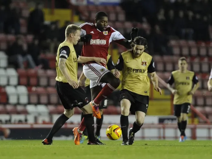 Framed Print : Bristol City's Jay Emmanuel-Thomas Tries to Break Through Two Defenders during Bristol City v Leyton Orient, Sky Bet League One Match at Ashton Gate