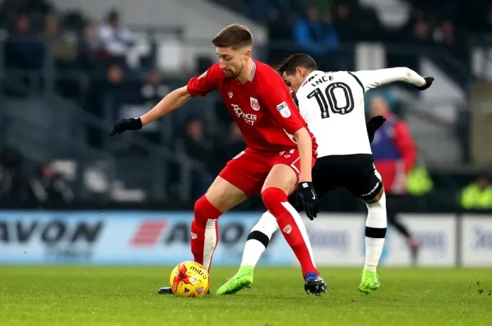 Framed Print : Bristol City's Jens Hegeler Dashes Past Derby County's Thomas Ince Framed Print : Bristol City's Jens Hegeler Dashes Past Derby County's Thomas Ince